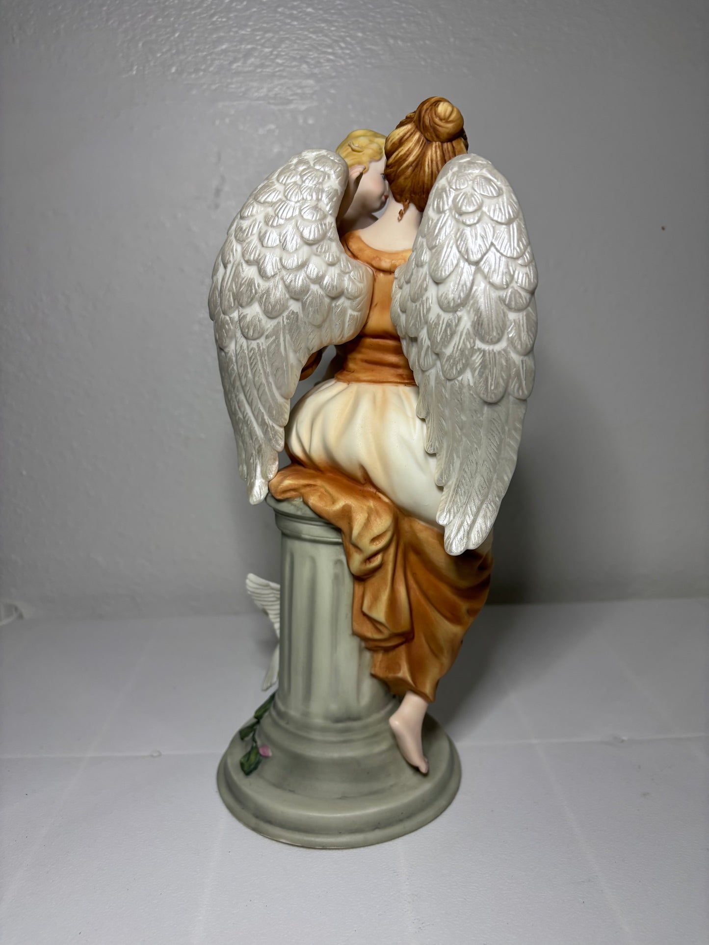 Vintage Porcelain Angel Figurine Holding Child – Hand-Painted Collectible