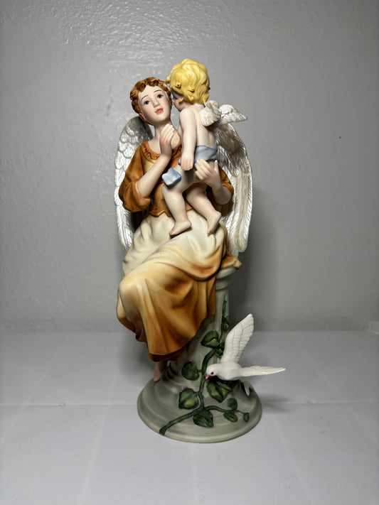 Vintage Porcelain Angel Figurine Holding Child – Hand-Painted Collectible